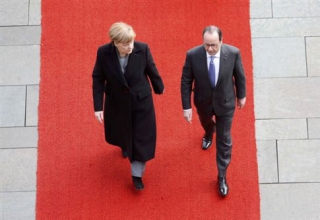 Ηχηρή παρέμβαση Μέρκελ και Ολάντ για ανακατανομή προσφύγων